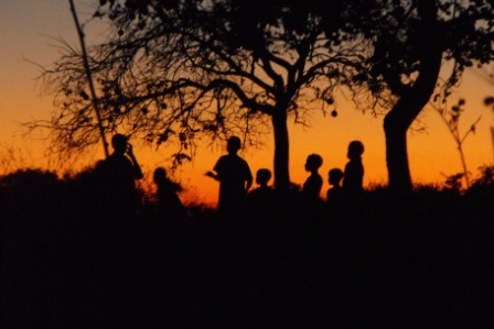 Sunset shot of children by the borehole